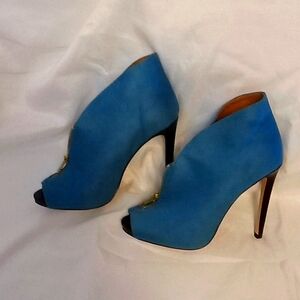 Teal colored, Size 8 1/2 heeled wedges.